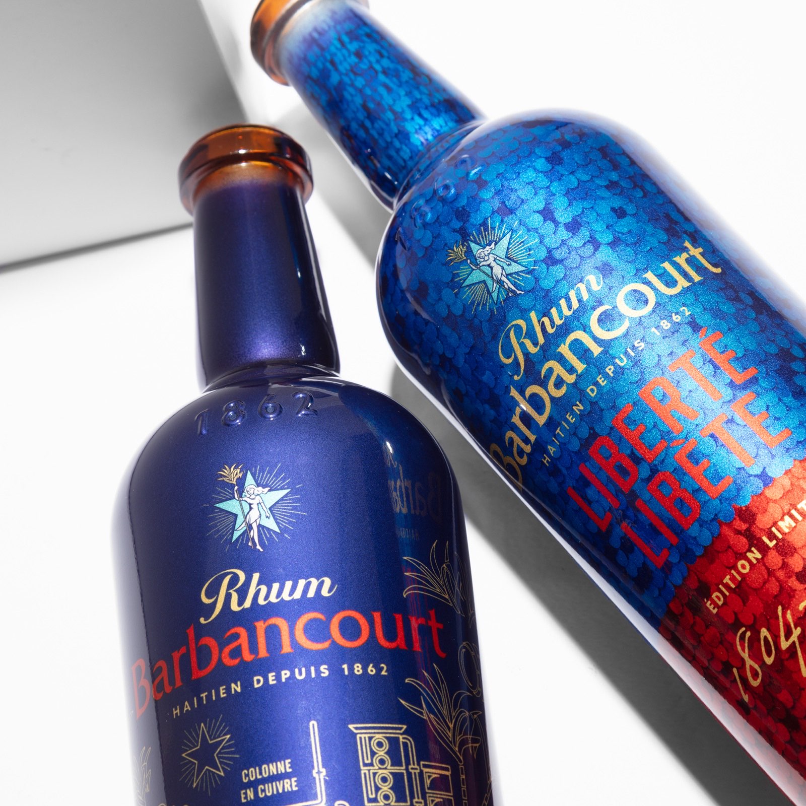 Detail: the 160th Anniversary's gold distillery drawings and the Liberté's sequin field