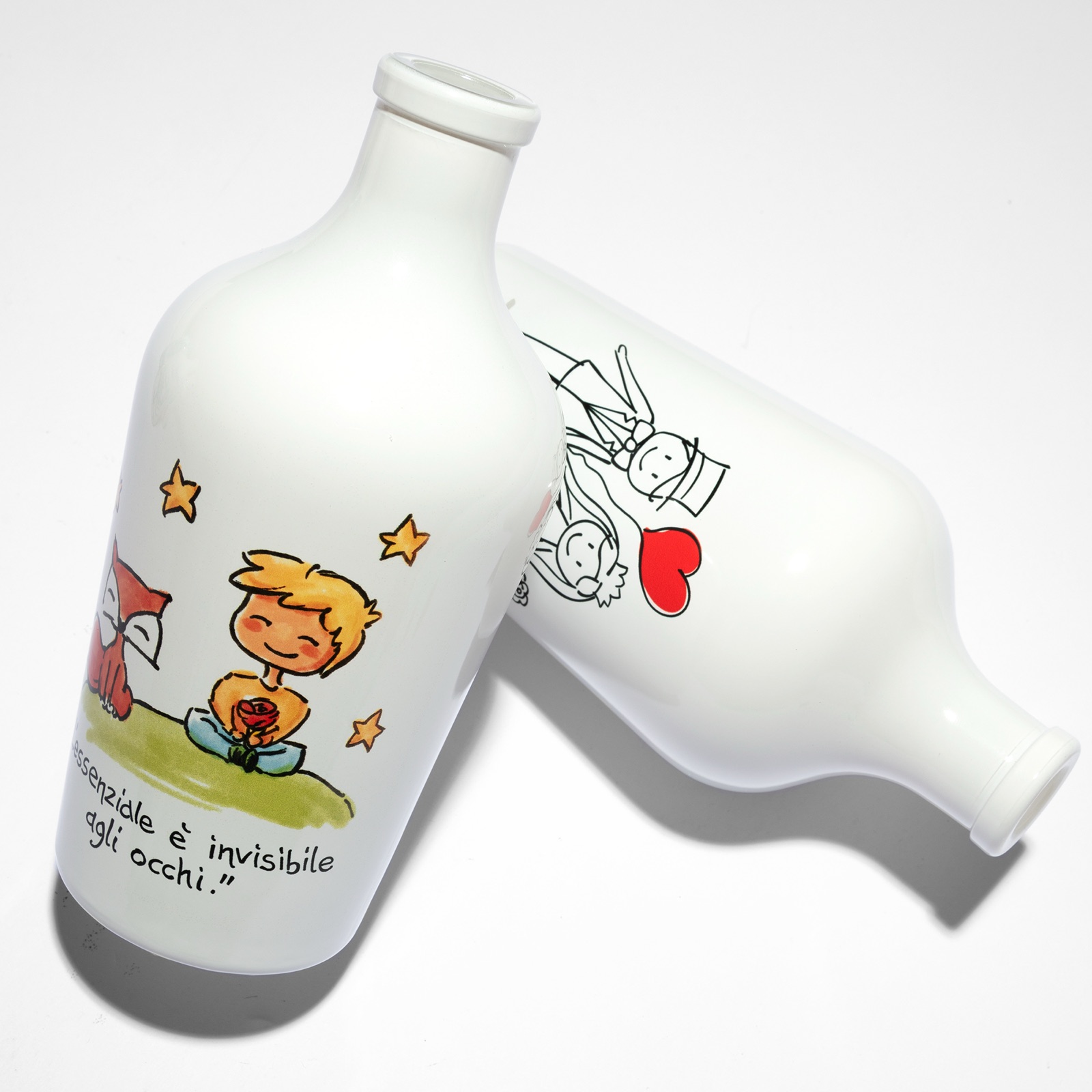 Frantoio Paparella — two illustrated editions side by side, same bottle, different artwork
