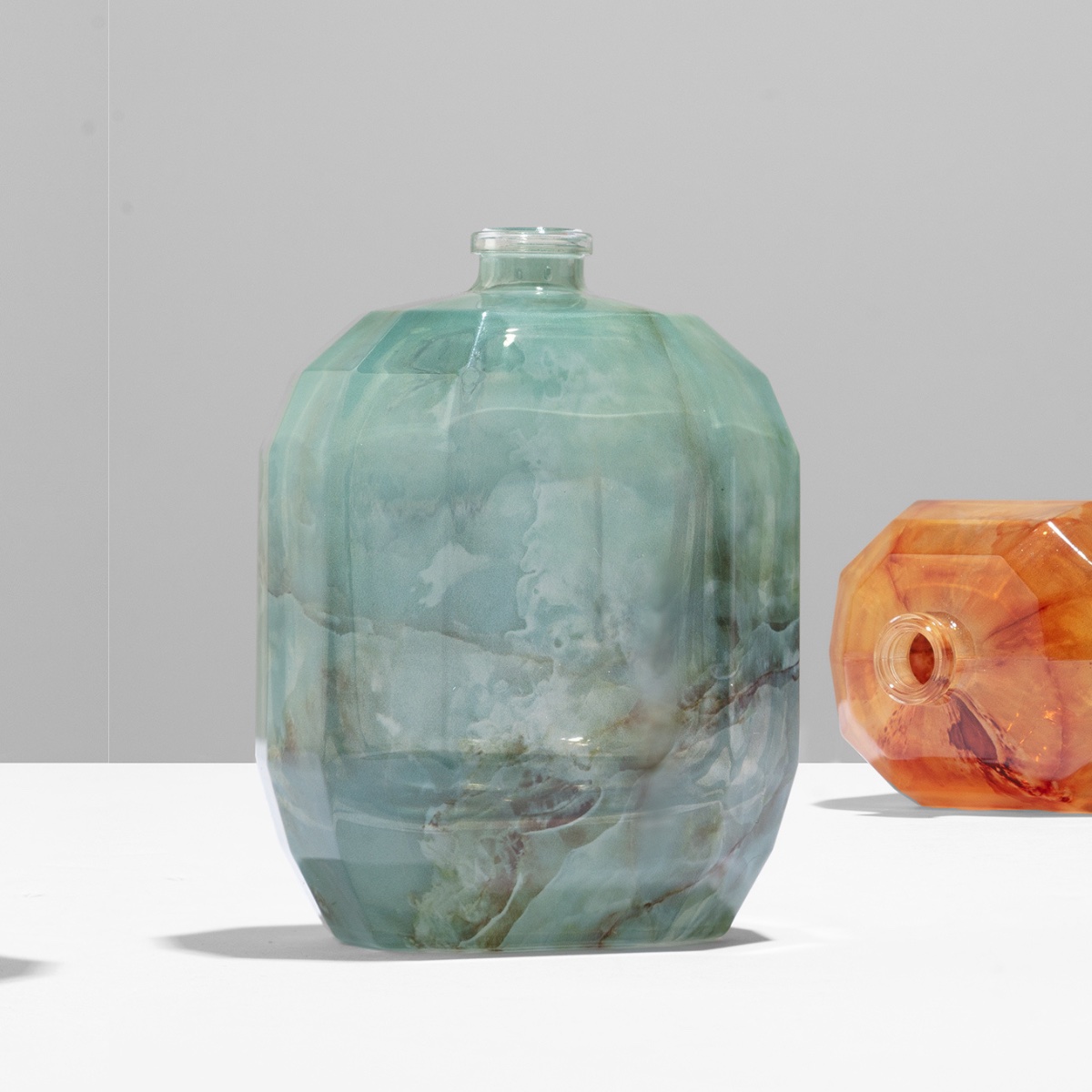 Sheer coverage — translucent marble-effect flacon by ATIU