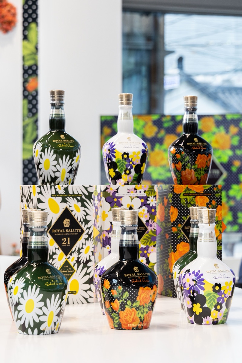 Six floral fashion-edition whisky bottles at the global launch event